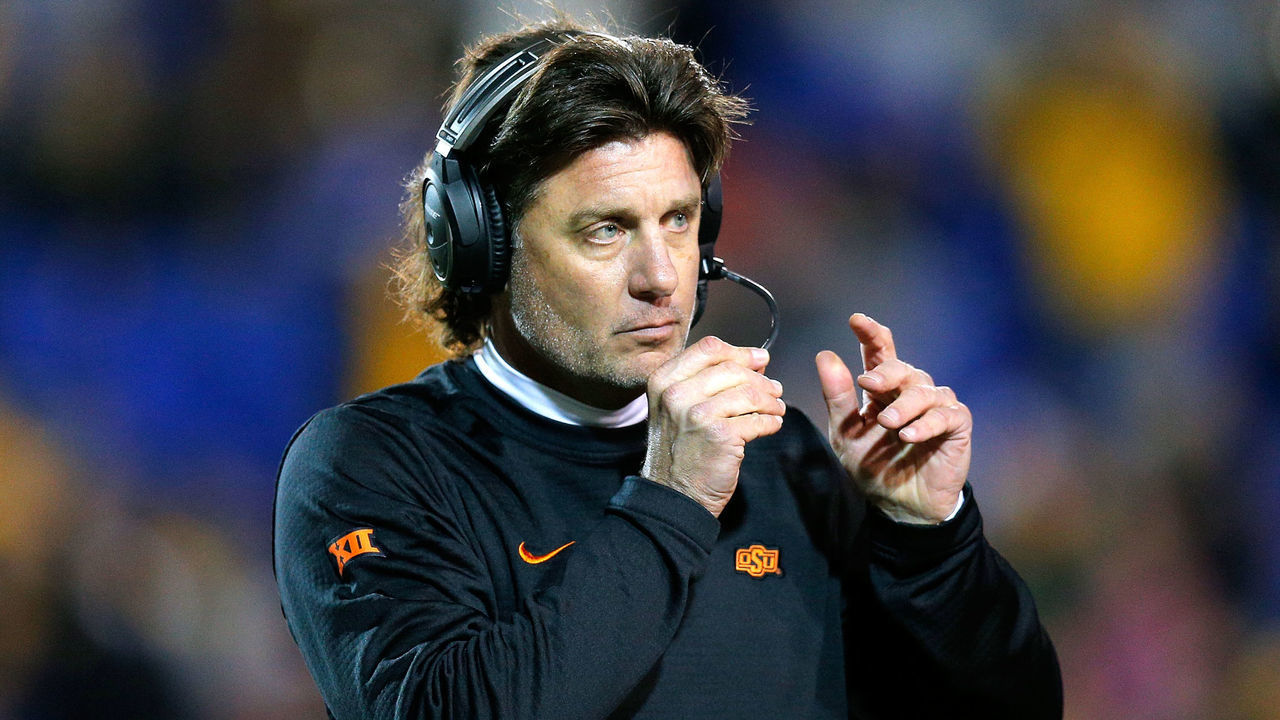 MEMPHIS, TENNESSEE - DECEMBER 31: Head coach Mike Gundy of the Oklahoma State Cowboys reacts during the second half of the AutoZone Liberty Bowl against the Missouri Tigers at the Liberty Bowl Memorial Stadium on December 31, 2018 in Memphis, Tennessee.