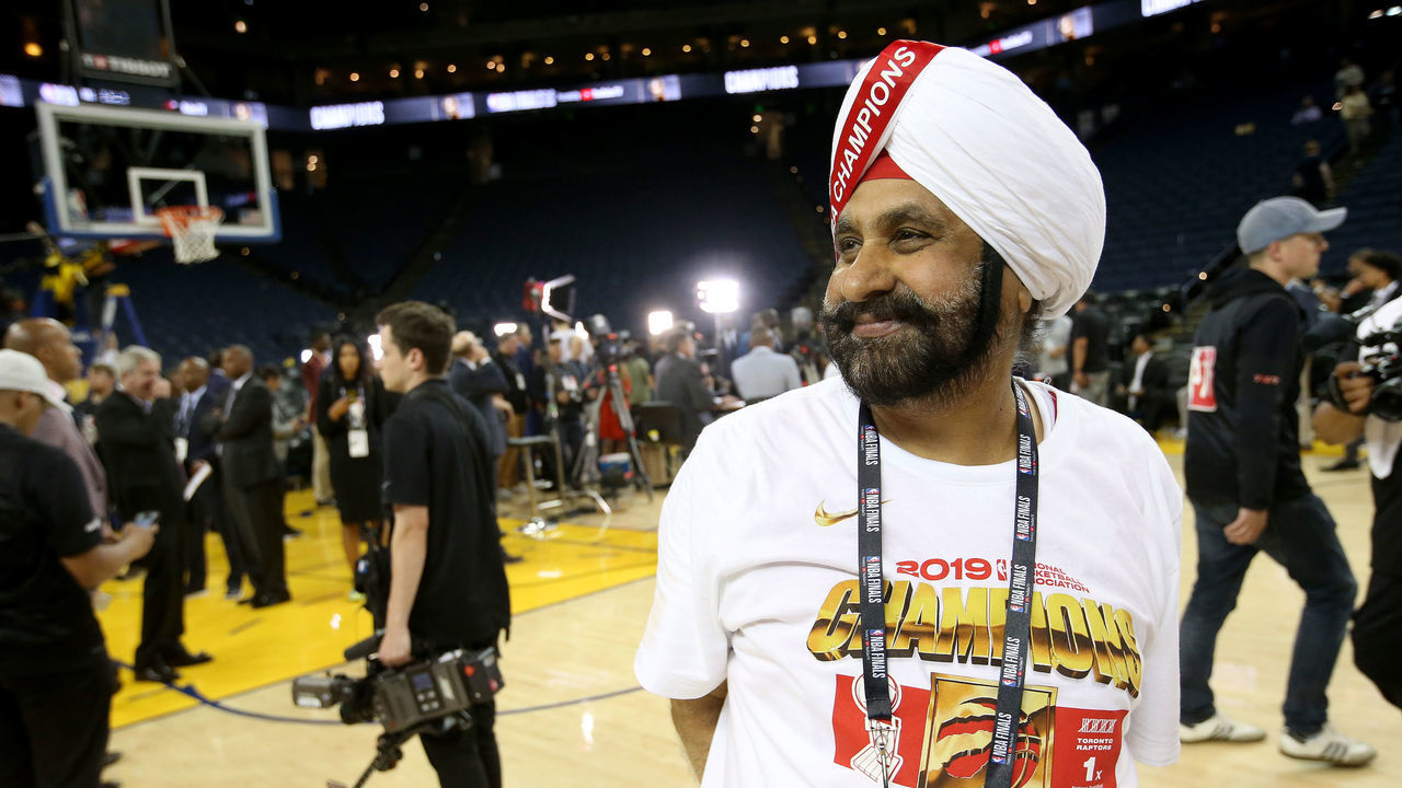OAKLAND, CA: JUNE 13: Toronto Raptors super fan Nav Bhatia celebrates their 114-110 win over the Golden State Warriors in Game 6 of the NBA Finals at Oracle Arena in Oakland, Calif., on Thursday, June 13, 2019.