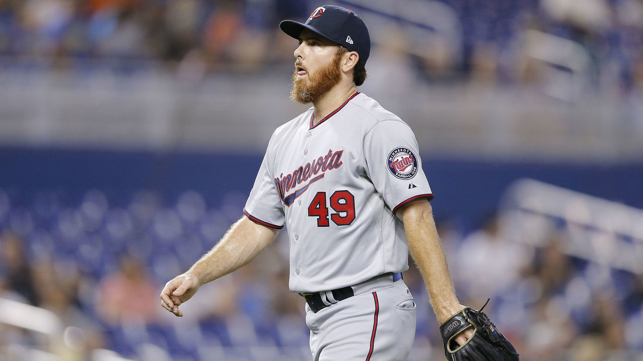 MIAMI, FLORIDA - AUGUST 01: Sam Dyson #49 of the Minnesota Twins reacts after being taken out of the game in the ninth inning against the Miami Marlins at Marlins Park on August 01, 2019 in Miami, Florida.