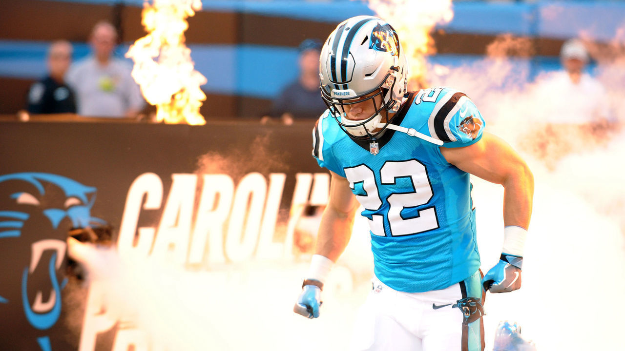 CHARLOTTE, NC - AUGUST 17: Carolina Panthers running back Christian McCaffrey (22) runs onto the field during intros prior to a preseason game between the Miami Dolphins and the Carolina Panthers on August 17, 2018, at Bank of America Stadium in Charlotte, NC.