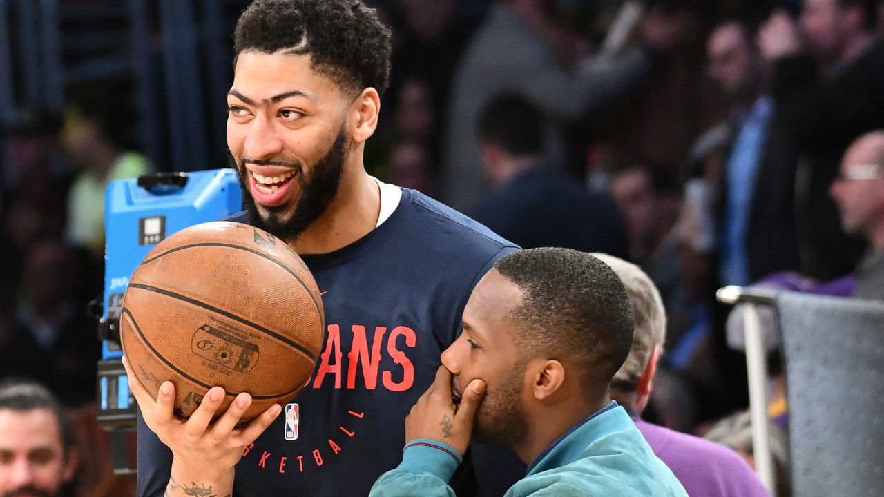 LOS ANGELES, CALIFORNIA - FEBRUARY 27: Agent Rich Paul (R) talks to his client Anthony Davis during halftime of a basketball game between the Los Angeles Lakers and the New Orleans Pelicans at Staples Center on February 27, 2019 in Los Angeles, California.