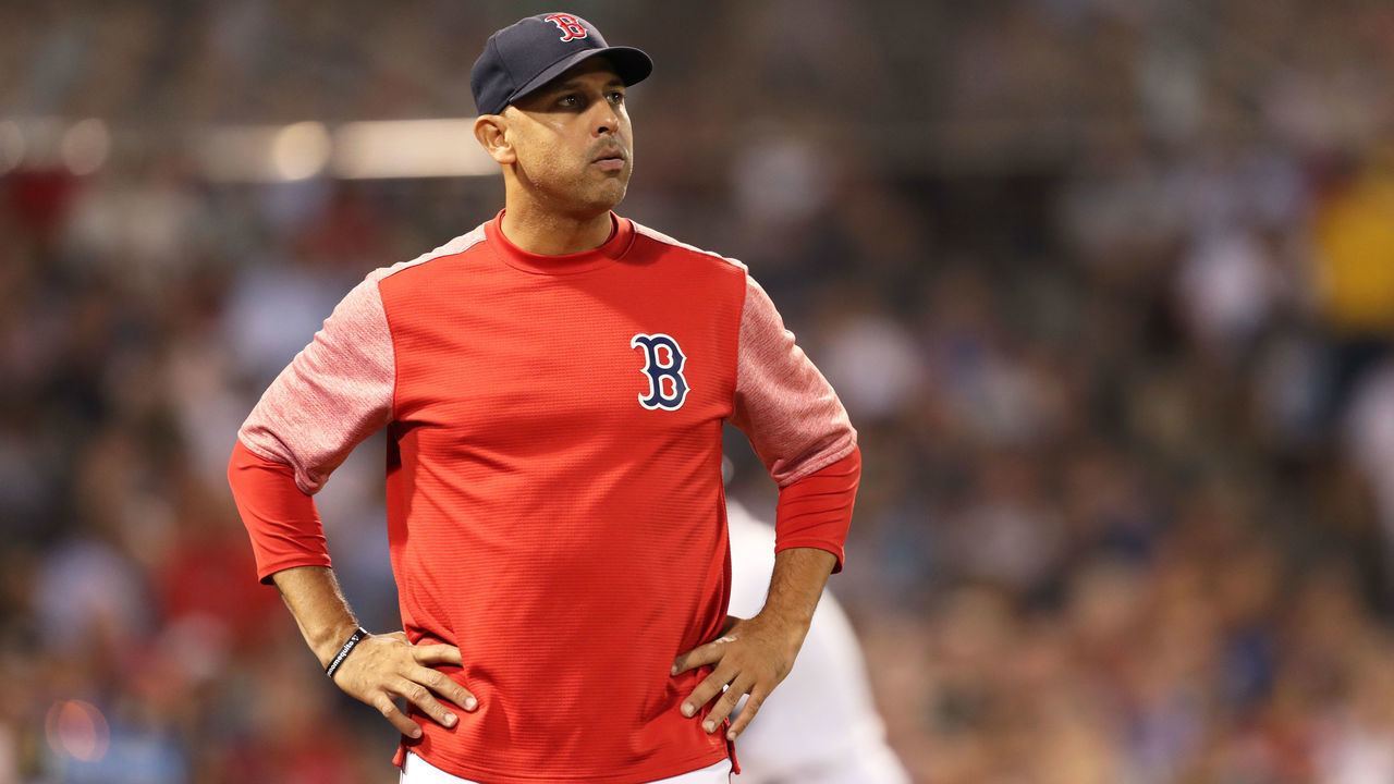 BOSTON, MA - JULY 25: Alex Cora #20 of the Boston Red Sox looks on during a game against the New York Yankees at Fenway Park on July 25, 2019 in Boston, Massachusetts.