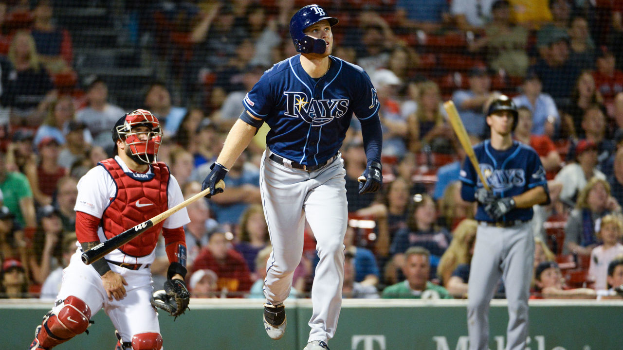 BOSTON, MA - AUGUST 1: Austin Meadows #17 of the Tampa Bay Rays hits a solo home run in the ninth inning against the Boston Red Sox at Fenway Park on August 1, 2019 in Boston, Massachusetts.