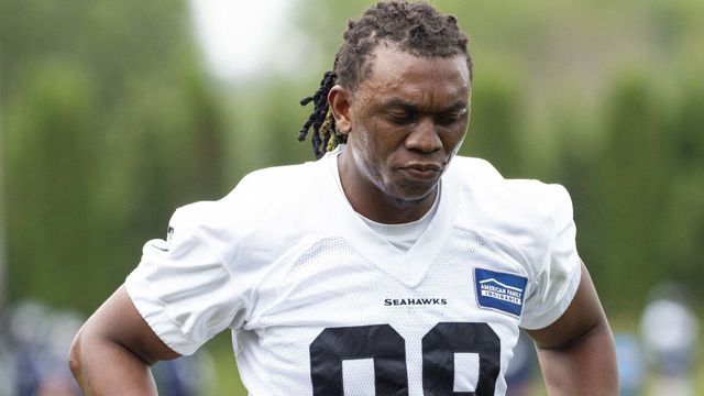 RENTON, WA - JUNE 06: Seattle Seahawks defensive end Ezekiel Ansah (98) reacts after dropping a pass during the Seattle Seahawks OTA on June 6, 2019 at the Virginia Mason Athletic Center in Renton, WA.