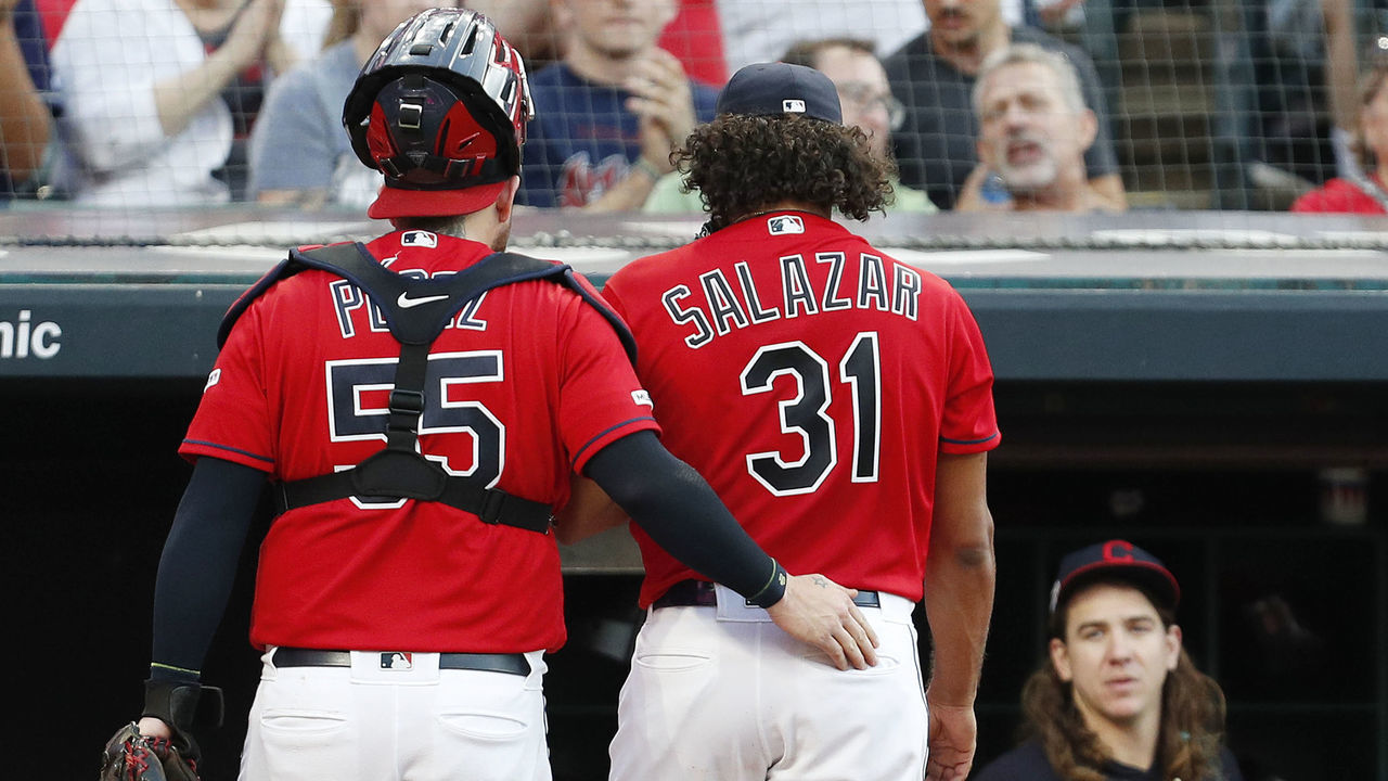 CLEVELAND, OH - AUGUST 01: Danny Salazar #31 of the Cleveland Indians walks to the dugout with Roberto Perez #55 as Mike Clevinger #52 looks on against the Houston Astros in the fourth inning at Progressive Field on August 1, 2019 in Cleveland, Ohio. The Astros defeated the Indians 7-1.