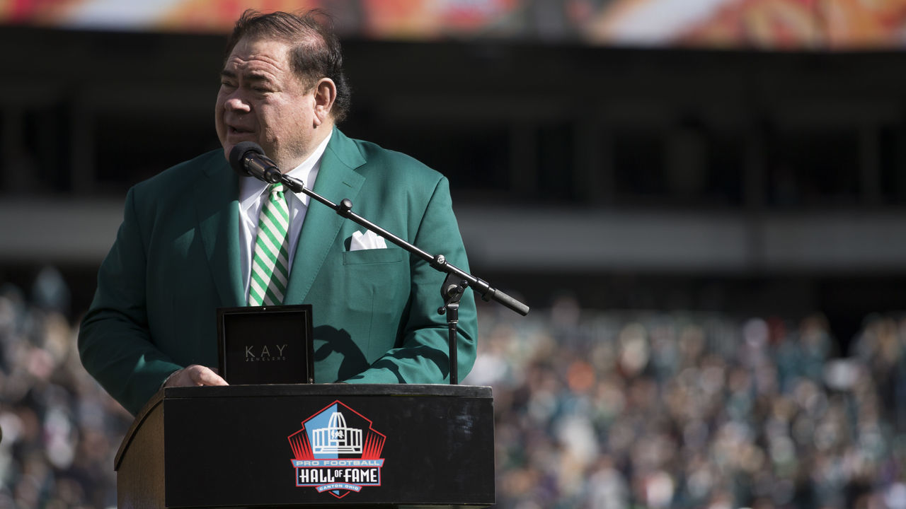 PHILADELPHIA, PA - OCTOBER 21: President of the Pro Football Hall of Fame, David Baker, presents Brian Dawkins (not pictured) with his Hall of Fame ring during halftime of the game between the Carolina Panthers and Philadelphia Eagles at Lincoln Financial Field on October 21, 2018 in Philadelphia, Pennsylvania.