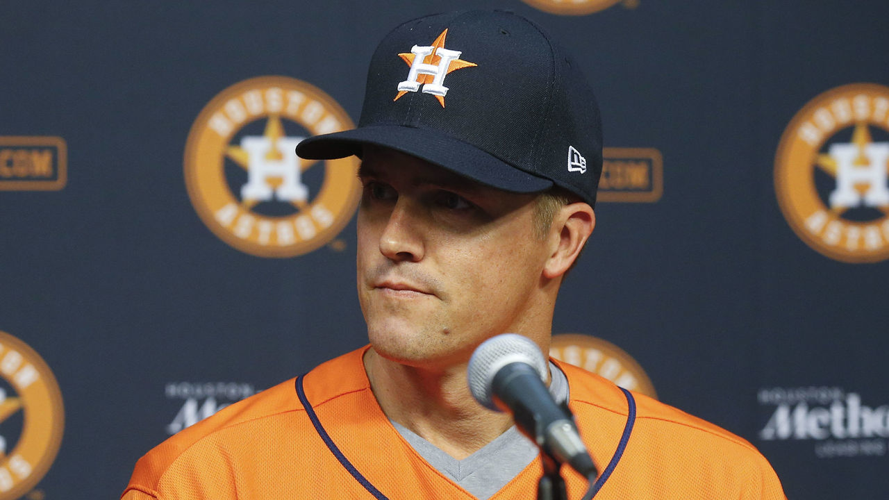 HOUSTON, TEXAS - AUGUST 02: Pitcher Zach Greinke of the Houston Astros talks with the media at Minute Maid Park on August 02, 2019 in Houston, Texas. Greinke was acquired at the trade deadline from the Arizona Diamondbacks.