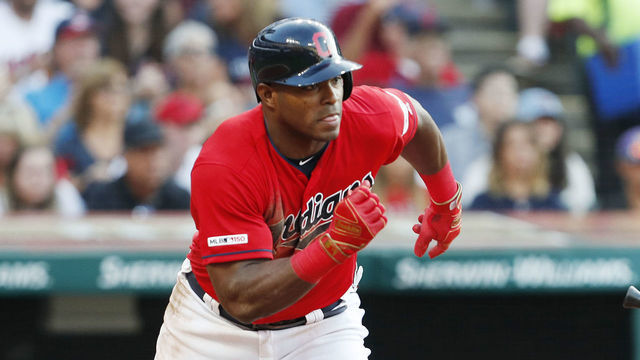 CLEVELAND, OH - AUGUST 02: Yasiel Puig #66 of the Cleveland Indians hits an RBI single to score Oscar Mercado #35 against the Los Angeles Angels of Anaheim in the second inning at Progressive Field on August 2, 2019 in Cleveland, Ohio.