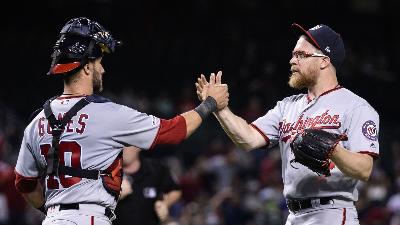 Washington Nationals' Brian Dozier and Adam Eaton celebrate after