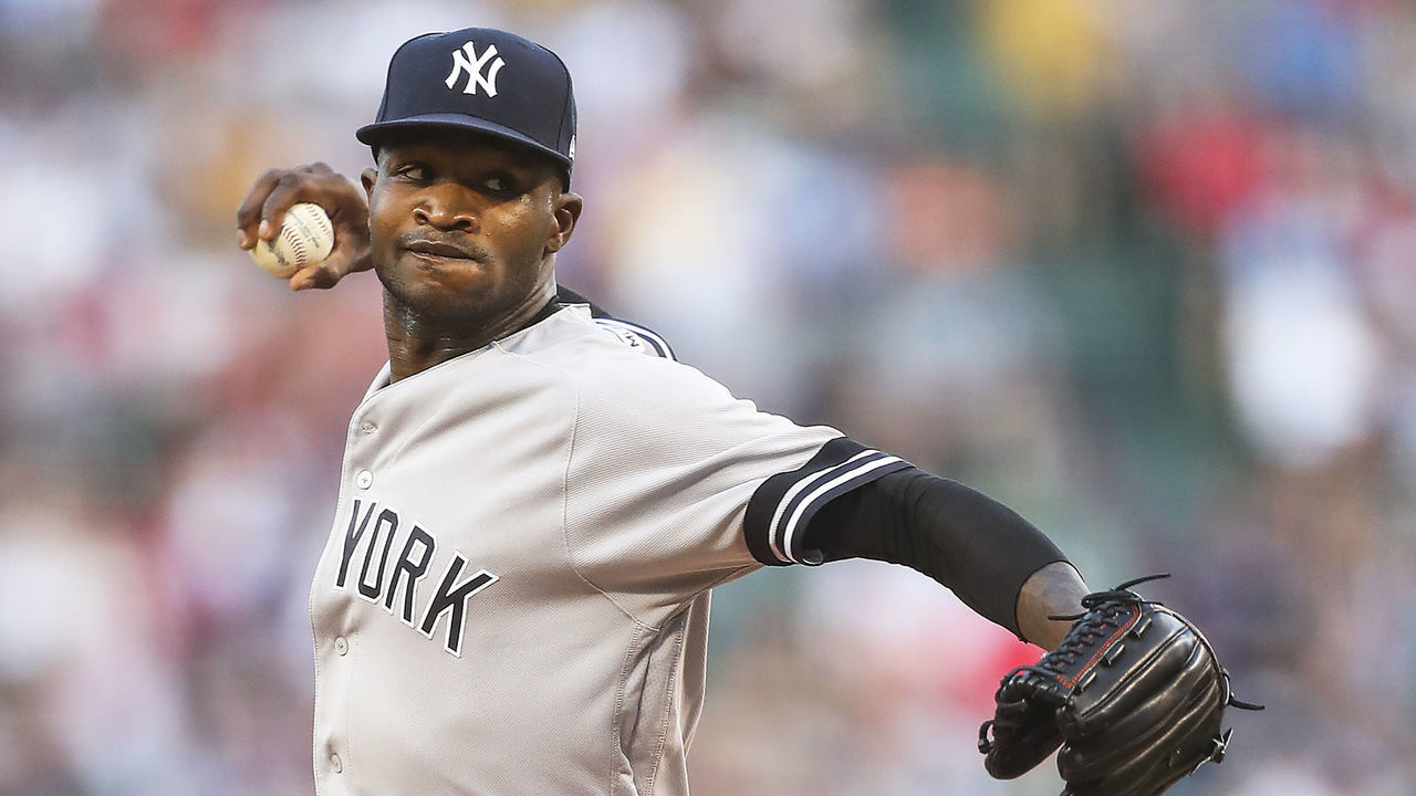 BOSTON, MA - JULY 28: Domingo German #55 of the New York Yankees pitches in the first inning against the Boston Red Sox at Fenway Park on July 28, 2019 in Boston, Massachusetts.