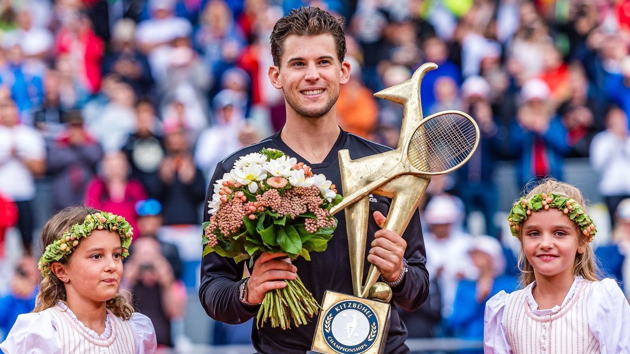 Dominic Thiem of Austria celebrates with the trophy after winning against Albert Ramos-Vinolas of Spain in the singles final match of the Generali Open Tennis Tournament of the ATP Tour in Kitzbuehel, Austria on August 3, 2019.