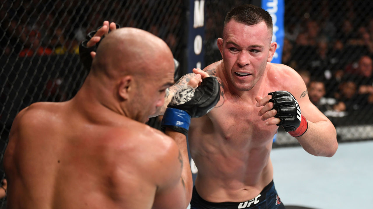 NEWARK, NJ - AUGUST 03: (R-L) Colby Covington punches Robbie Lawler in their welterweight bout during the UFC Fight Night event at the Prudential Center on August 3, 2019 in Newark, New Jersey.