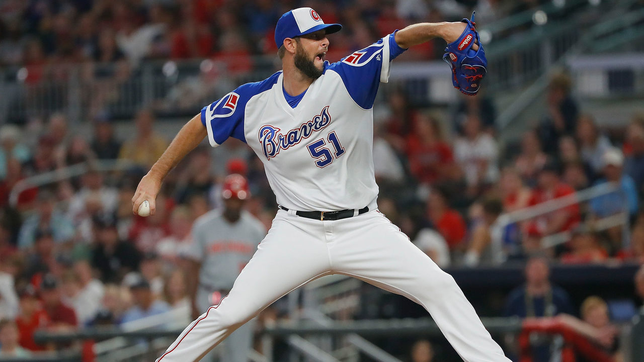 ATLANTA, GEORGIA - AUGUST 02: Chris Martin #51 of the Atlanta Braves makes his Braves debut as he pitches in the eighth inning against the Cincinnati Reds at SunTrust Park on August 02, 2019 in Atlanta, Georgia.