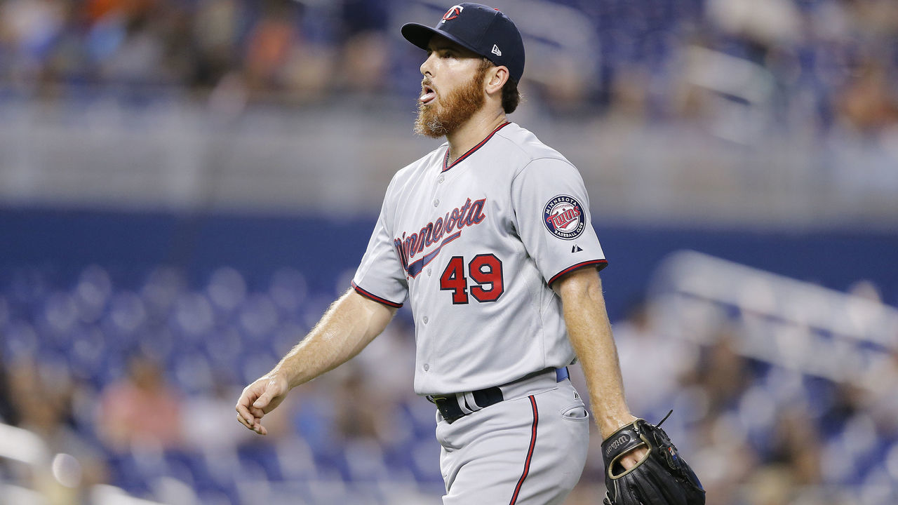 MIAMI, FLORIDA - AUGUST 01: Sam Dyson #49 of the Minnesota Twins reacts against the Miami Marlins at Marlins Park on August 01, 2019 in Miami, Florida.