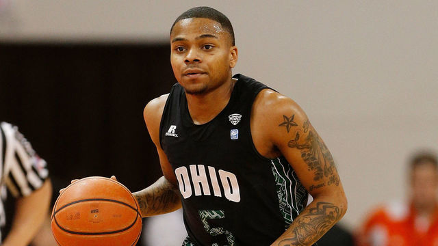 BOWLING GREEN, OH - MARCH 02: D.J. Cooper #5 of the Ohio Bobcats looks on while playing the Bowling Green Falcons at the Stroh Center on March 2, 2013 in Bowling Green, Ohio. Ohio won the game 78-65.