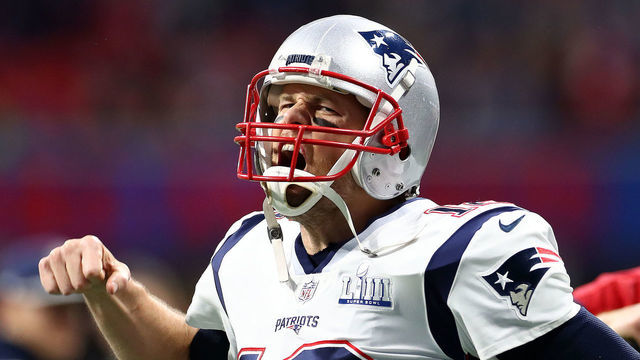 ATLANTA, GEORGIA - FEBRUARY 03: Tom Brady #12 of the New England Patriots pumps his fist running onto the field before Super Bowl LIII against the Los Angeles Rams at Mercedes-Benz Stadium on February 03, 2019 in Atlanta, Georgia.
