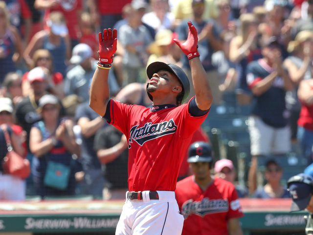 CLEVELAND, OH - AUGUST 04: Cleveland Indians shortstop Francisco Lindor (12) celebrates as he crosses the plate after hitting a home run during the third inning of the Major League Baseball game between the Los Angeles Angels and Cleveland Indians on August 4, 2019, at Progressive Field in Cleveland, OH.