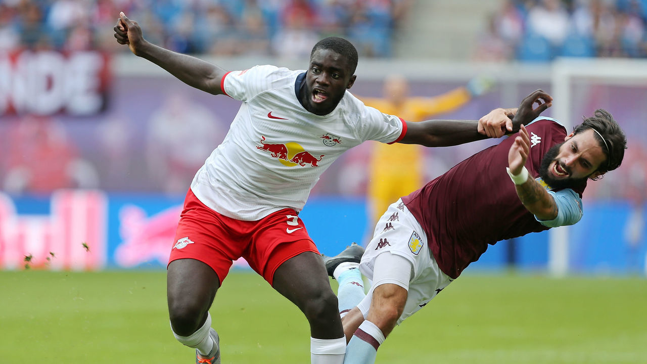 LEIPZIG, GERMANY - AUGUST 03: Dayot Upamecano (L) of Leipzig challenges for the ball with Jota of Aston Villa during the pre-season friendly match between RB Leipzig and Aston Villa at Red Bull Arena on August 3, 2019 in Leipzig, Germany.
