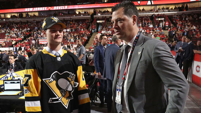 CHICAGO, IL - JUNE 24: Clayton Phillips meets Bill Guerin after being selected 93rd overall by the Pittsburgh Penguins during the 2017 NHL Draft at United Center on June 24, 2017 in Chicago, Illinois.