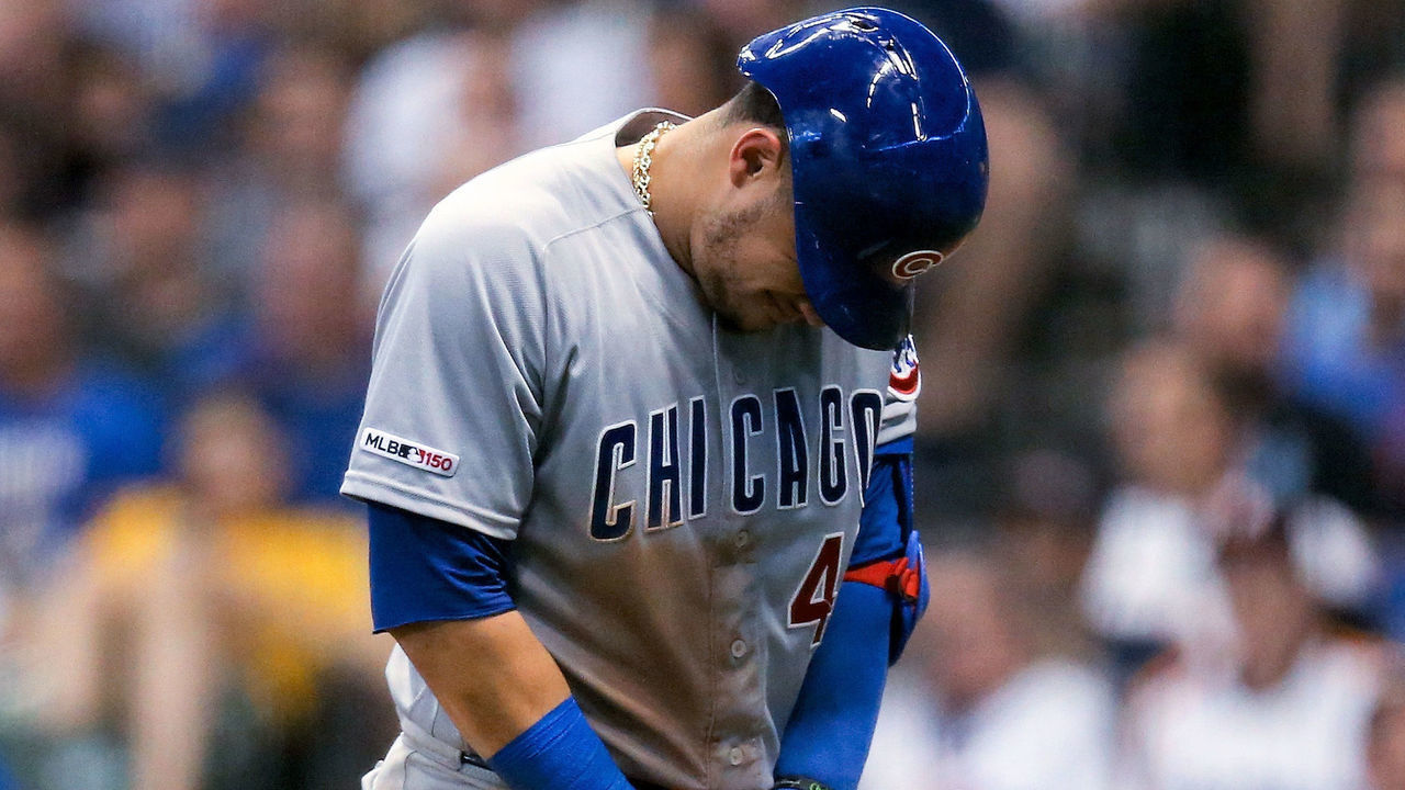 MILWAUKEE, WISCONSIN - JULY 27: Willson Contreras #40 of the Chicago Cubs reacts after hitting his hand on a pitch in the eighth inning against the Milwaukee Brewers at Miller Park on July 27, 2019 in Milwaukee, Wisconsin.