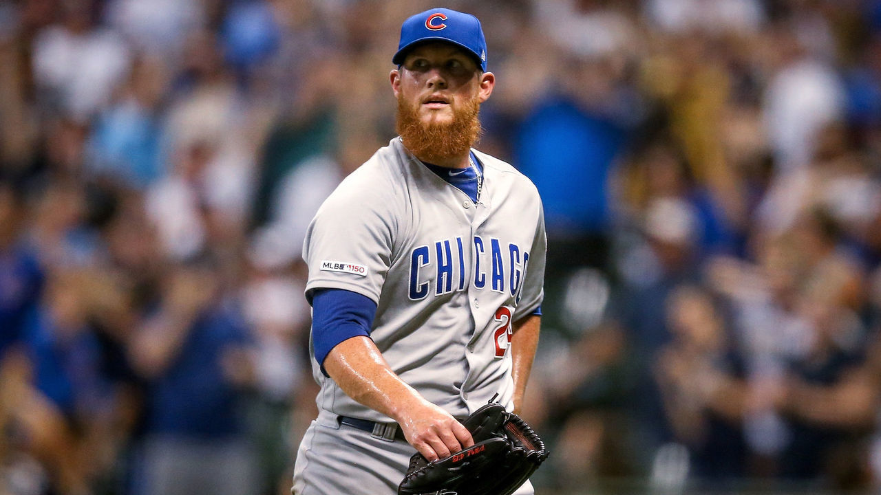 MILWAUKEE, WISCONSIN - JULY 27: Craig Kimbrel #24 of the Chicago Cubs walks off the field after giving up a home run to Keston Hiura #18 of the Milwaukee Brewers in the tenth inning at Miller Park on July 27, 2019 in Milwaukee, Wisconsin.