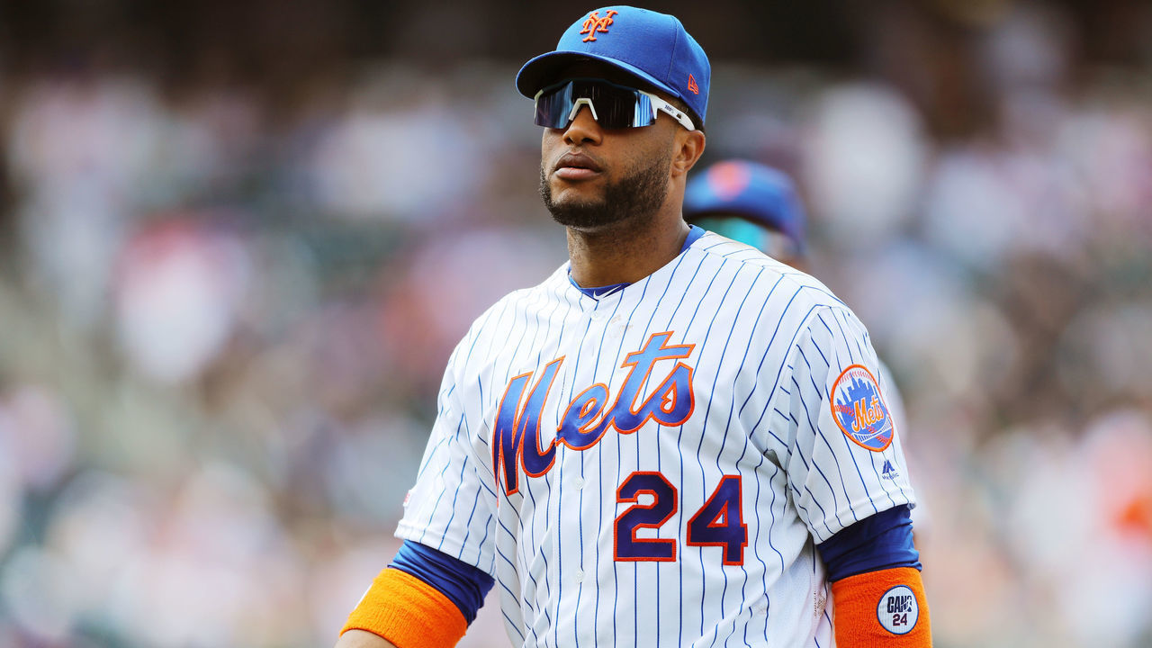 FLUSHING, NY - JULY 25: Robinson Cano #24 of the New York Mets returns to the dugout during the game between the San Diego Padres and the New York Mets at Citi Field on Thursday, July 25, 2019 in Flushing, New York.