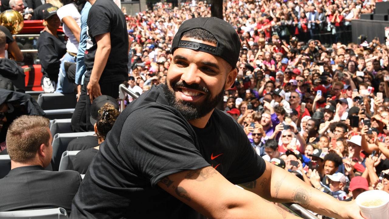 TORONTO, ON - JUNE 17: Rapper, Drake smiles during the Toronto Raptors Championship Victory Parade on June 17, 2019 in Toronto, Ontario. NOTE TO USER: User expressly acknowledges and agrees that, by downloading and/or using this photograph, user is consenting to the terms and conditions of Getty Images License Agreement. Mandatory Copyright Notice: Copyright 2019 NBAE