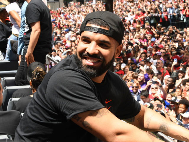 TORONTO, ON - JUNE 17: Rapper, Drake smiles during the Toronto Raptors Championship Victory Parade on June 17, 2019 in Toronto, Ontario. NOTE TO USER: User expressly acknowledges and agrees that, by downloading and/or using this photograph, user is consenting to the terms and conditions of Getty Images License Agreement. Mandatory Copyright Notice: Copyright 2019 NBAE