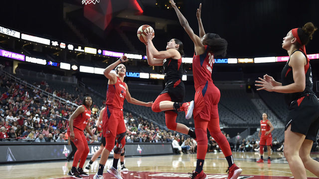 LAS VEGAS, NV - AUGUST 5: Kelsey Plum #10 of the Las Vegas Aces goes up for the shot against the Washington Mystics on August 5, 2019 at the T-Mobile Arena in Las Vegas, Nevada. Mandatory Copyright Notice: Copyright 2019 NBAE