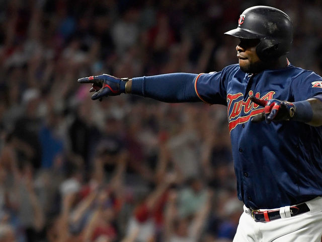 MINNEAPOLIS, MN - AUGUST 05: Miguel Sano #22 of the Minnesota Twins celebrates hitting a two-run, walk-off home run against the Atlanta Braves in the ninth inning of the interleague game on August 5, 2019 at Target Field in Minneapolis, Minnesota. The Twins defeated the Braves 5-3.