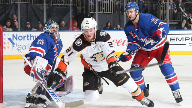 NEW YORK, NY - DECEMBER 19: Henrik Lundqvist #30 and Kevin Shattenkirk #22 of the New York Rangers defend the net against Chris Wagner #21 of the Anaheim Ducks at Madison Square Garden on December 19, 2017 in New York City.