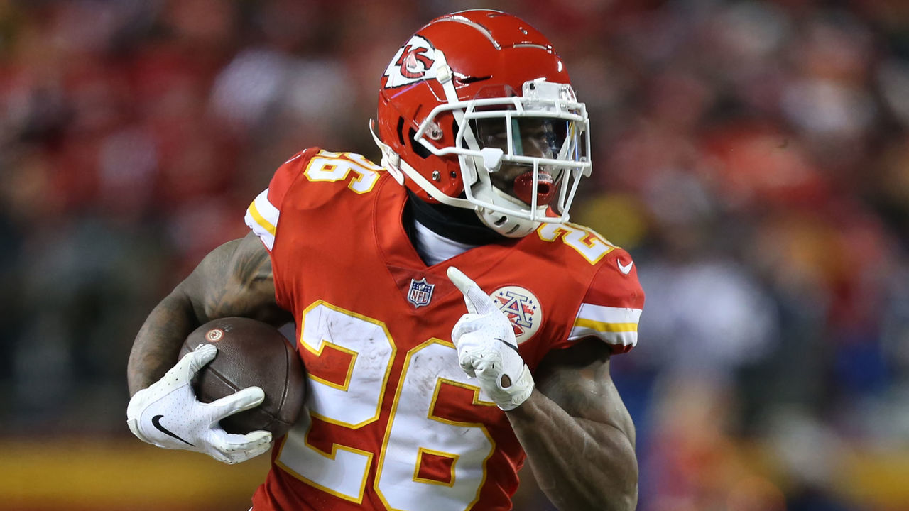 KANSAS CITY, MO - JANUARY 20: Kansas City Chiefs running back Damien Williams (26) runs after the catch for 33-yards at the end of the third quarter of the AFC Championship Game game between the New England Patriots and Kansas City Chiefs on January 20, 2019 at Arrowhead Stadium in Kansas City, MO.