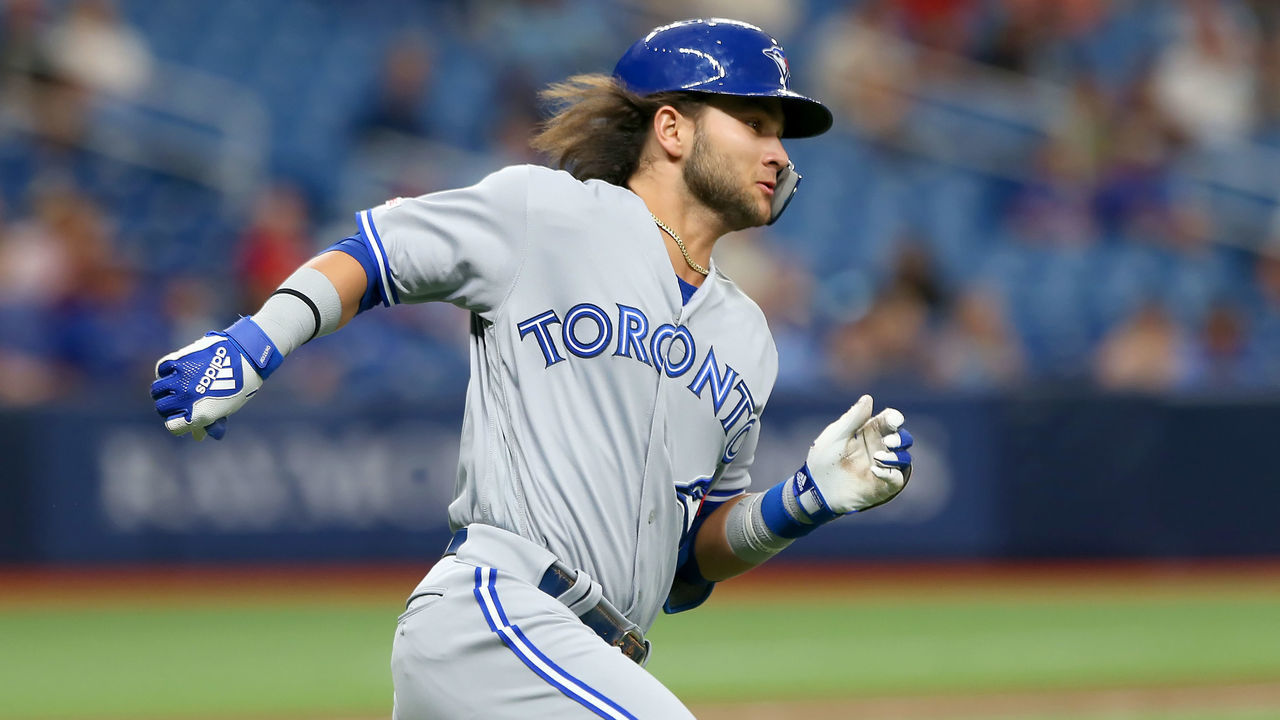 ST. PETERSBURG, FL - AUG 05: Bo Bichette (11) of the Blue Jays hits a ground rule double during the MLB regular season game between the Toronto Blue Jays and the Tampa Bay Rays on August 05, 2019, at Tropicana Field in St. Petersburg, FL.