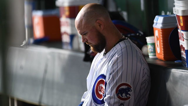 CHICAGO, ILLINOIS - AUGUST 06: Jon Lester #34 of the Chicago Cubs sits in the dugout during the fourth inning against the Oakland Athletics at Wrigley Field on August 06, 2019 in Chicago, Illinois.