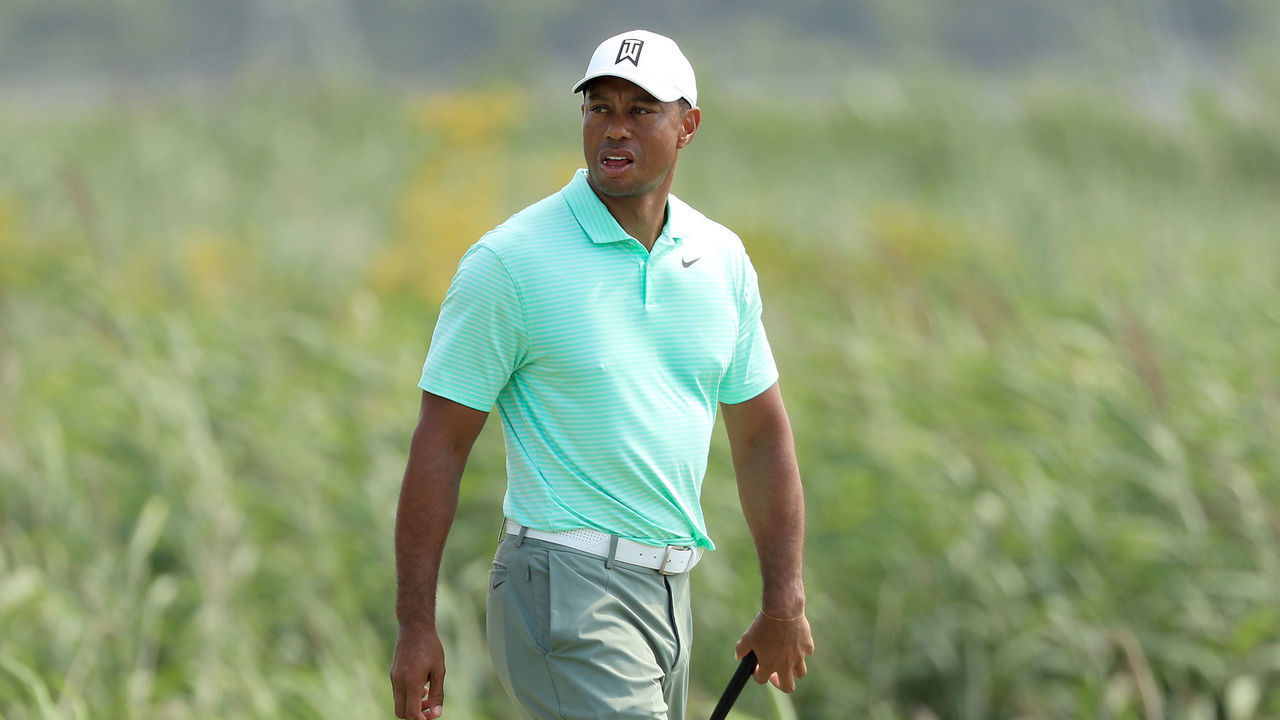 JERSEY CITY, NEW JERSEY - AUGUST 07: Tiger Woods of the United States looks on during a practice round of the Northern Trust at Liberty National Golf Club on August 7, 2019 in Jersey City, New Jersey.