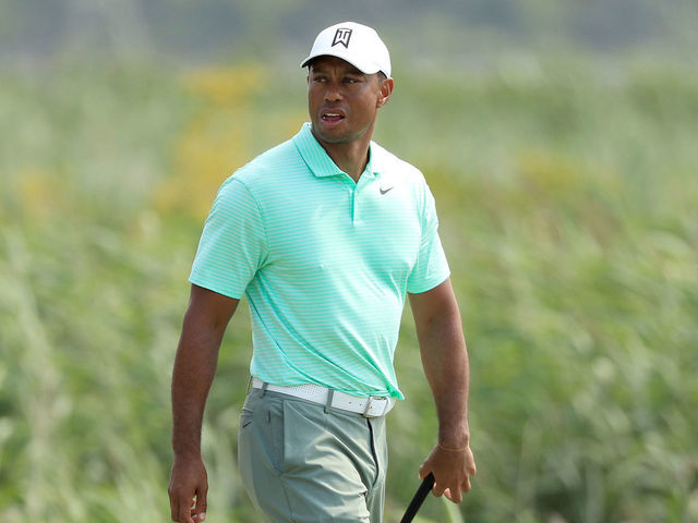 JERSEY CITY, NEW JERSEY - AUGUST 07: Tiger Woods of the United States looks on during a practice round of the Northern Trust at Liberty National Golf Club on August 7, 2019 in Jersey City, New Jersey.