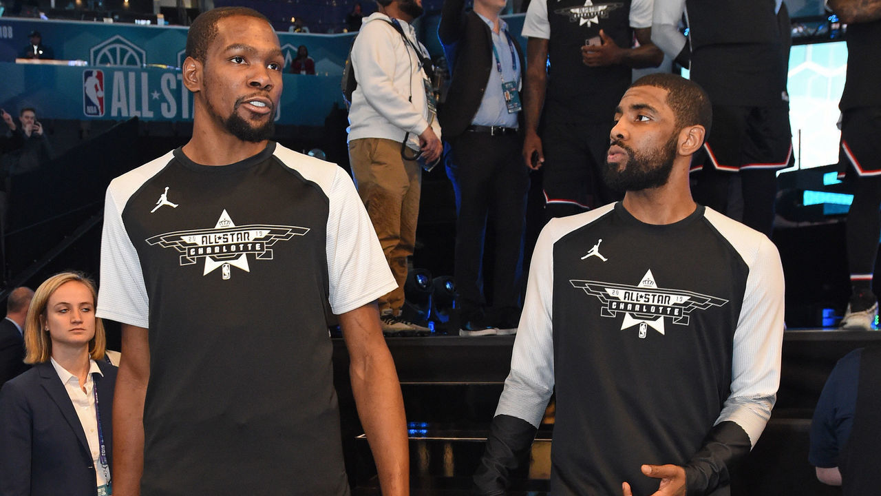 CHARLOTTE, NC - FEBRUARY 17: Kevin Durant #35 and Kyrie Irving #11 of Team LeBron are seen before the game against Team Giannis during the 2019 NBA All-Star Game on February 17, 2019 at Spectrum Center in Charlotte, North Carolina. Mandatory Copyright Notice: Copyright 2019 NBAE