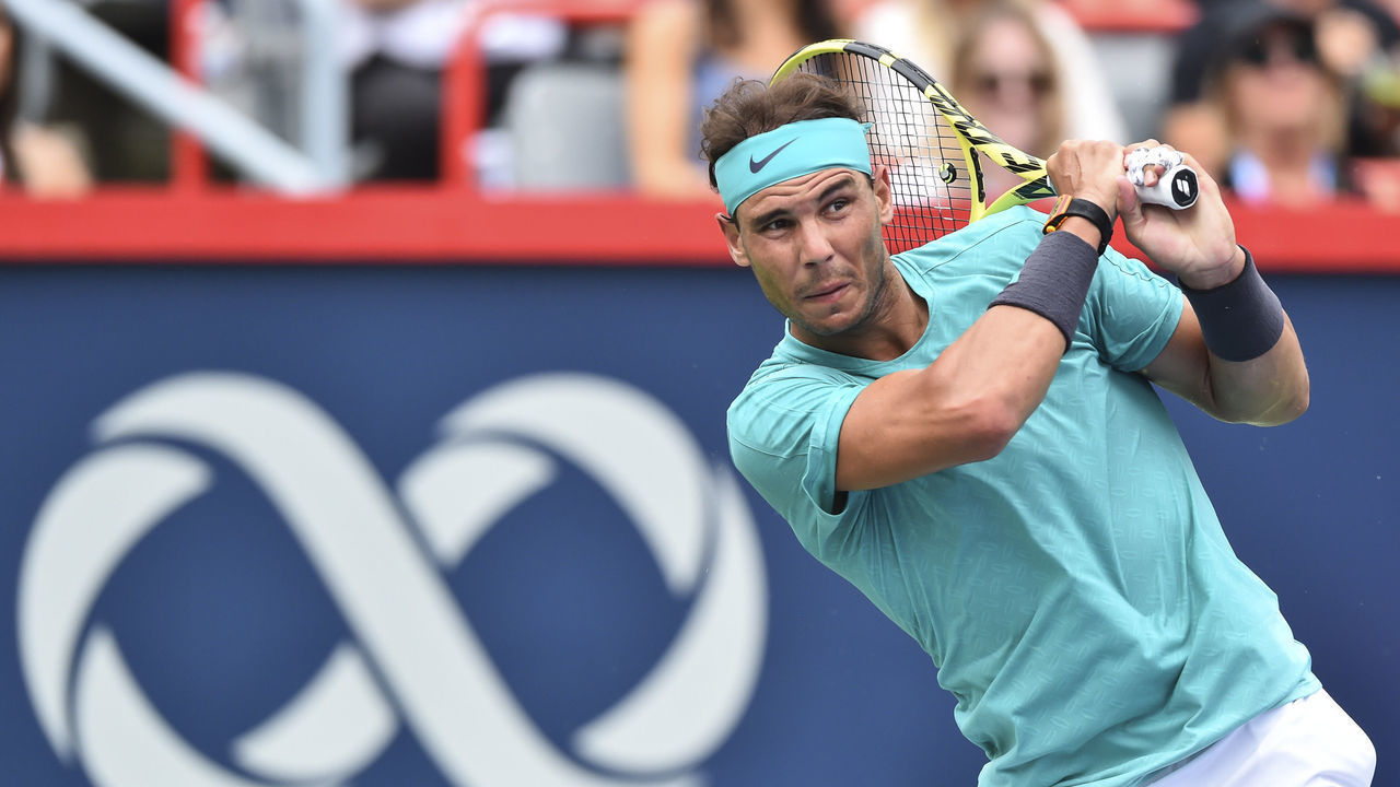 MONTREAL, QC - AUGUST 07: Rafael Nadal of Spain looks on after hitting a return against Daniel Evans of Great Britain during day 6 of the Rogers Cup at IGA Stadium on August 7, 2019 in Montreal, Quebec, Canada.