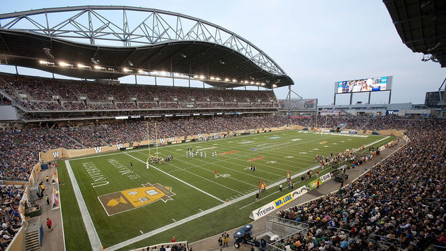 WINNIPEG, MB - AUGUST 7: A general view of the field and stadium in a CFL game between the Saskatchewan Roughriders and Winnipeg Blue Bombers at Investors Group Field on August 7, 2014 in Winnipeg, Manitoba, Canada.