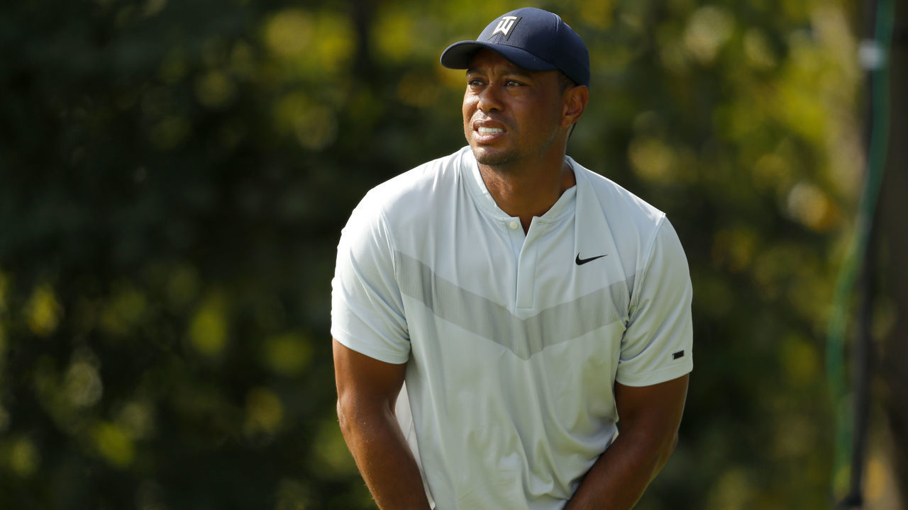 JERSEY CITY, NEW JERSEY - AUGUST 08: Tiger Woods of the United States hits off the 18th tee during the first round of The Northern Trust at Liberty National Golf Club on August 08, 2019 in Jersey City, New Jersey.