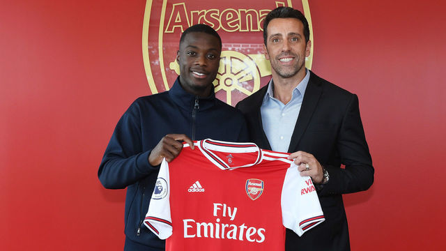 ST ALBANS, ENGLAND - JULY 31: Arsenal Director of Football Edu poses with new signing Nicolas Pepe (L) at London Colney on July 31, 2019 in St Albans, England.