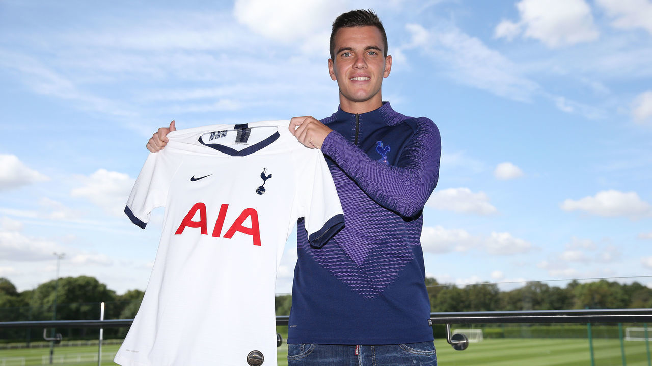 ENFIELD, ENGLAND - AUGUST 08: Tottenham Hotspur new loan signing Giovani Lo Celso poses for a photograph at Tottenham Hotspur Training Centre on August 08, 2019 in Enfield, England.
