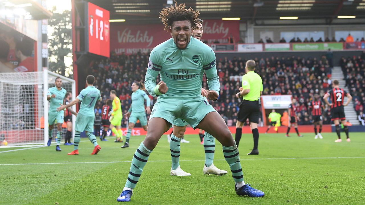 BOURNEMOUTH, ENGLAND - NOVEMBER 25: Alex Iwobi celebrates the 2nd Arsenal goal during the Premier League match between AFC Bournemouth and Arsenal FC at Vitality Stadium on November 25, 2018 in Bournemouth, United Kingdom.