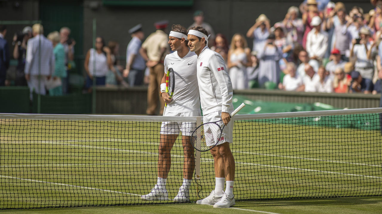 LONDON, ENGLAND - July 12: Rafael Nadal of Spain and Roger Federer of Switzerland pose for a photograph before the start of their Men's Singles Semifinals on Centre Court during the Wimbledon Lawn Tennis Championships at the All England Lawn Tennis and Croquet Club at Wimbledon on July 12, 2019 in London, England.