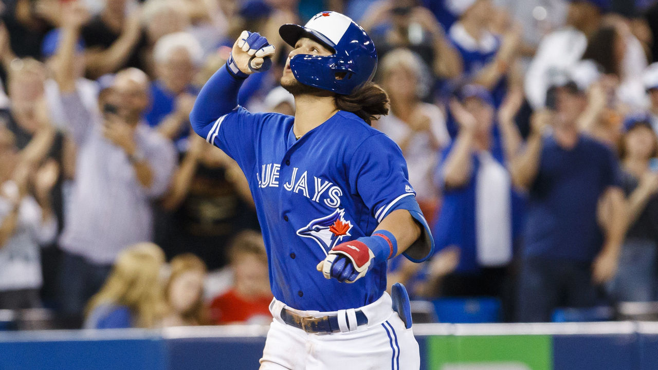 TORONTO, ONTARIO - AUGUST 8: Bo Bichette #11 of the Toronto Blue Jays scores on his two-run home run against the New York Yankees in the fifth inning during their MLB game at the Rogers Centre on August 8, 2019 in Toronto, Canada.
