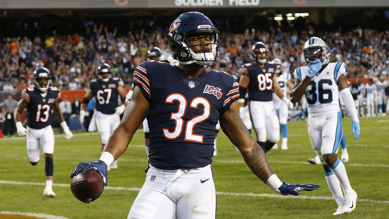 CHICAGO, ILLINOIS - AUGUST 08: David Montgomery #32 of the Chicago Bears reacts after scoring a touchdown against the Carolina Panthers during a preseason game at Soldier Field on August 08, 2019 in Chicago, Illinois.