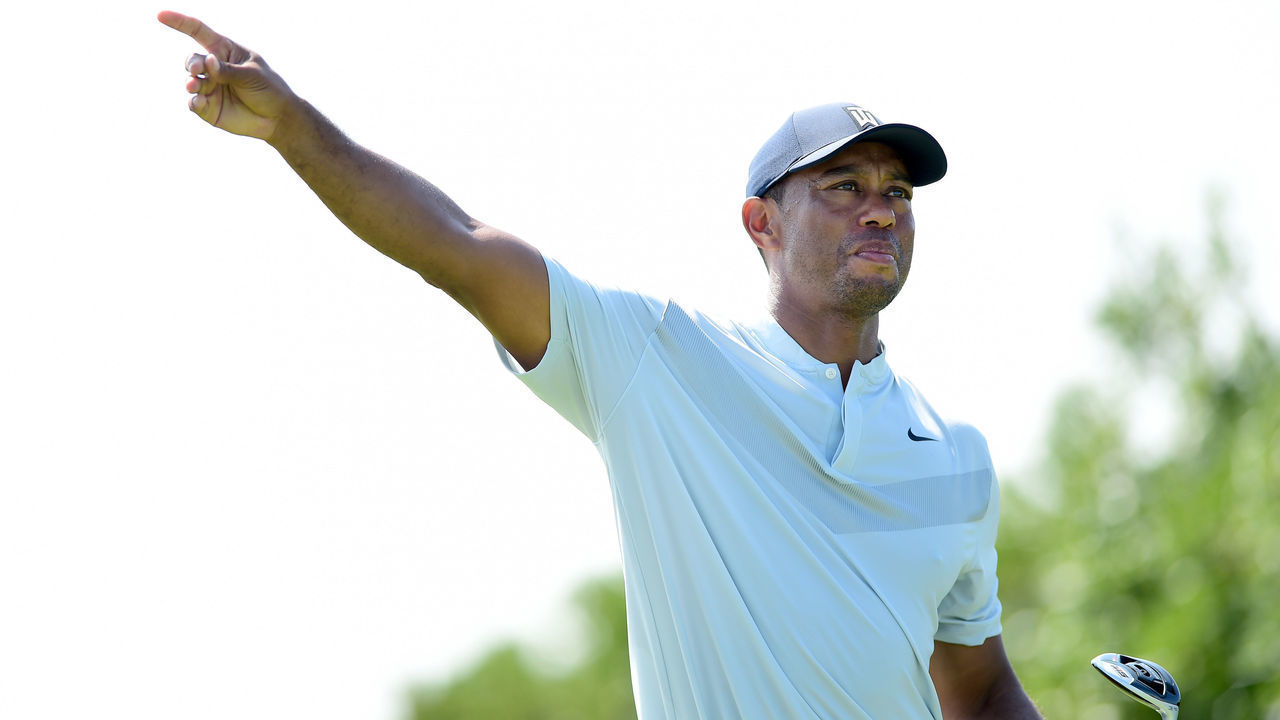 JERSEY CITY, NEW JERSEY - AUGUST 08: Tiger Woods of the United States hits off the third tee during the first round of The Northern Trust at Liberty National Golf Club on August 08, 2019 in Jersey City, New Jersey.