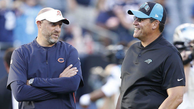 CHICAGO, ILLINOIS - AUGUST 08: Chicago Bears head coach Matt Nagy (L) speaks with Carolina Panthers head coach Ron Rivera prior to a preseason game at Soldier Field on August 08, 2019 in Chicago, Illinois.