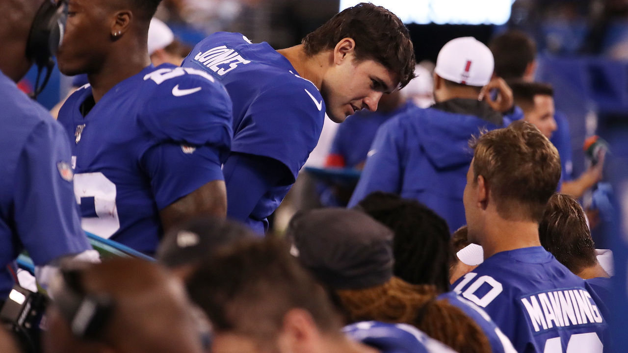 EAST RUTHERFORD, NEW JERSEY - AUGUST 08: Daniel Jones #8 of the New York Giants speaks with Eli Manning #10 during their Pre Season game against the New York Jets at MetLife Stadium on August 08, 2019 in East Rutherford, New Jersey.
