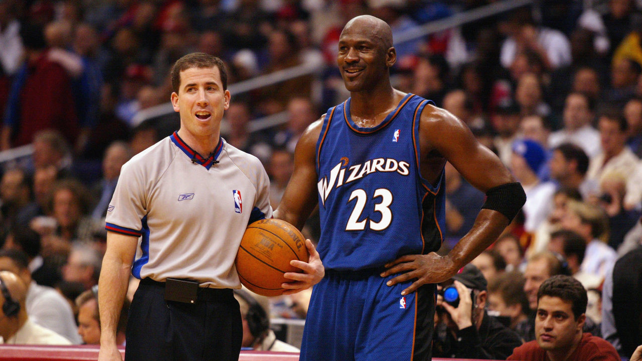 LOS ANGELES - FEBRUARY 12: Michael Jordan #23 of the Washington Wizards talks with referee Tim Donaghy during the game against the Los Angeles Clippers on February 12, 2003 at Staples Center in Los Angeles, California. The Wizards won 108-104. NOTE TO USER: User expressly acknowledges and agrees that, by downloading and or using this photograph, user is consenting to the terms and conditions of the Getty Images license agreement.